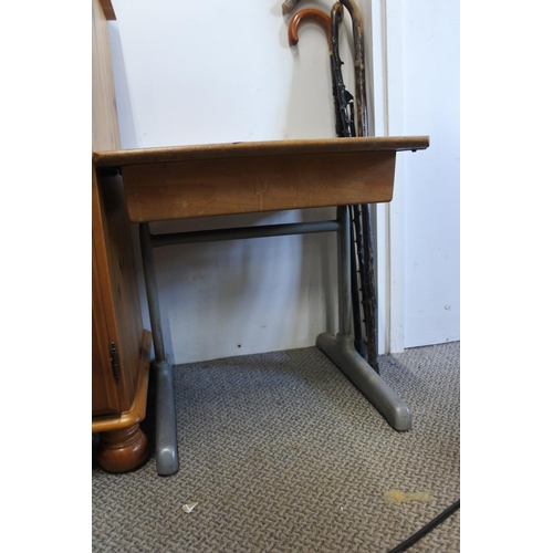 542 - A vintage child's metal framed desk.