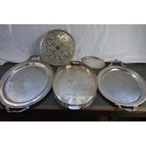 549 - A lot of very large silver plated trays and more.