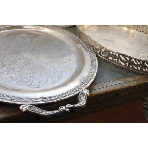 549 - A lot of very large silver plated trays and more.