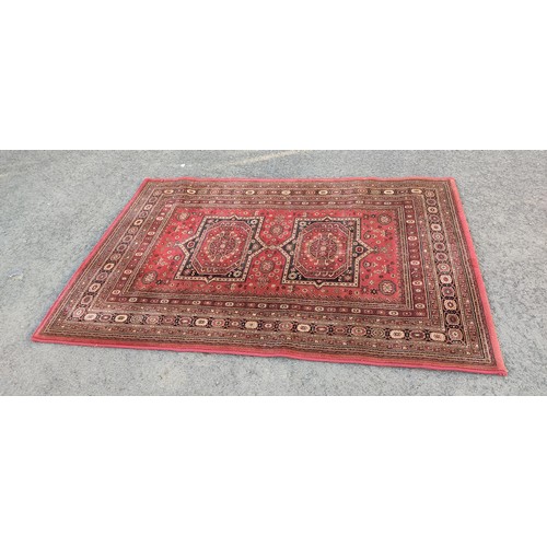 412 - A Beluchi floor rug.