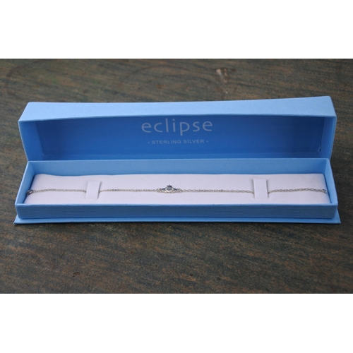 597 - A boxed Eclipse sterling silver Claddagh bracelet