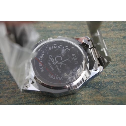 599 - 3 Gents fashion wristwatches.