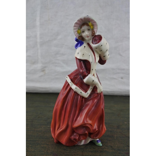 663 - A Royal Doulton figurine 'Christmas Morn' HN1992.