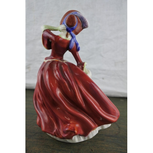 665 - A Royal Doulton figurine 'Autumn Breezes' HN1934.