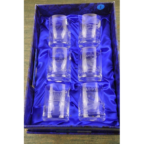 673 - A boxed set of Duiske Irish crystal glasses with whiskey brands to include Jameson, Black Bush, John... 