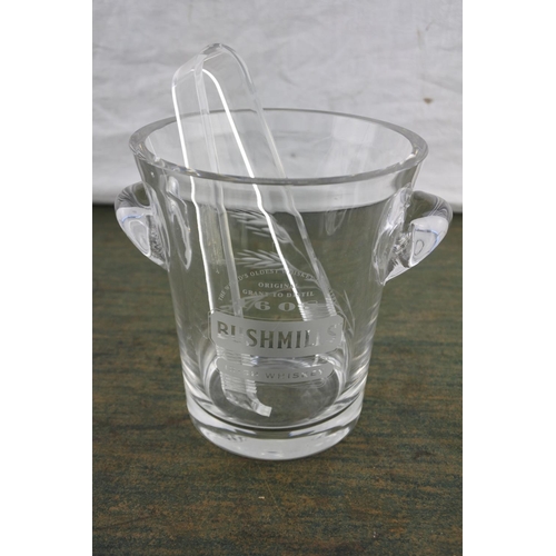 686 - A stunning 'Bushmills' whiskey glass ice bucket and tongs.