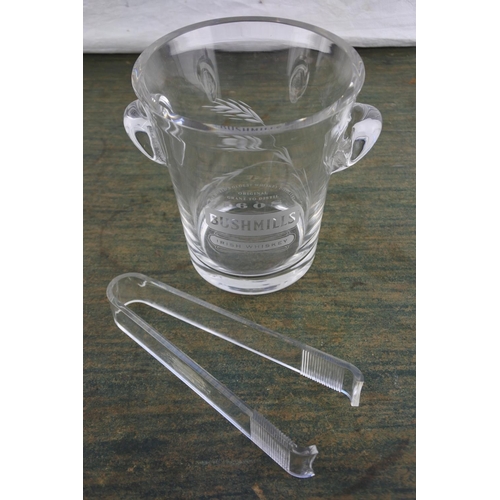 686 - A stunning 'Bushmills' whiskey glass ice bucket and tongs.