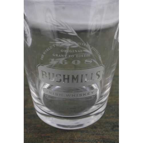 686 - A stunning 'Bushmills' whiskey glass ice bucket and tongs.