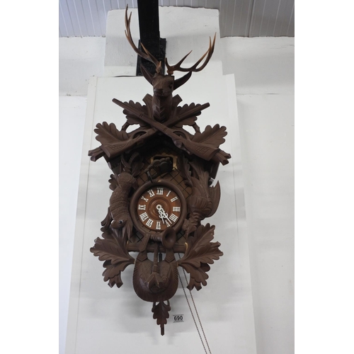 690 - A stunning very large cuckoo clock in need of restoration.