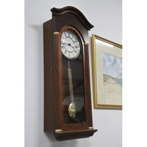 695 - A Hermle wall clock.