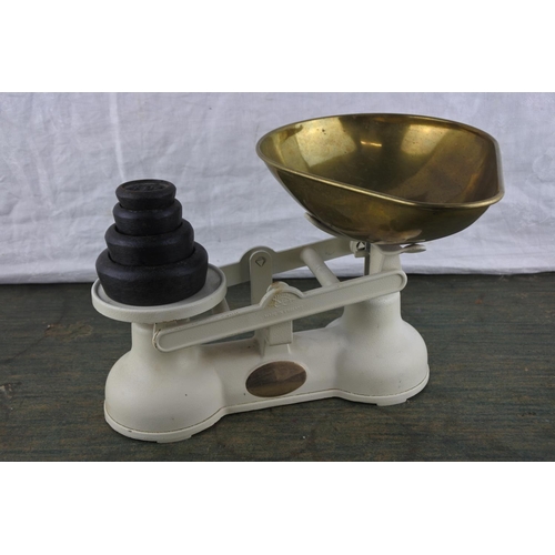 701 - A set of Salter weighing scales and weights.