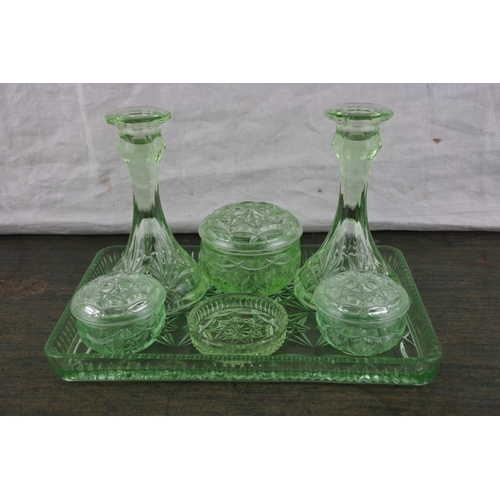 711 - A vintage green glass dressing table set.