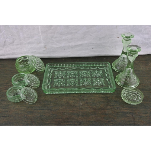 711 - A vintage green glass dressing table set.