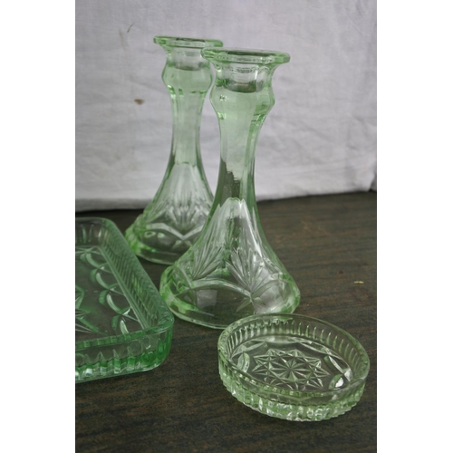 711 - A vintage green glass dressing table set.