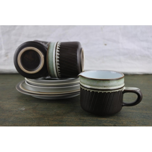 714 - A vintage Denby part teaset.