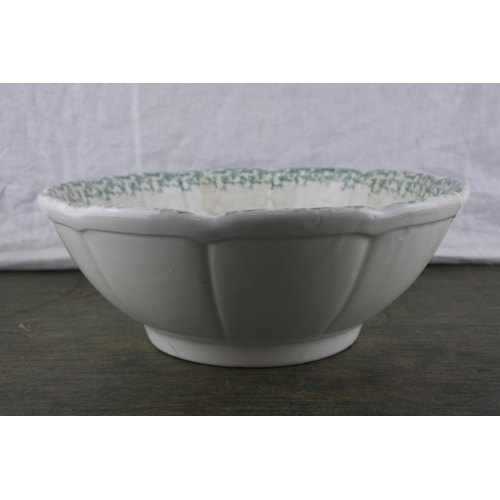 715 - A large bowl with fruit pattern.