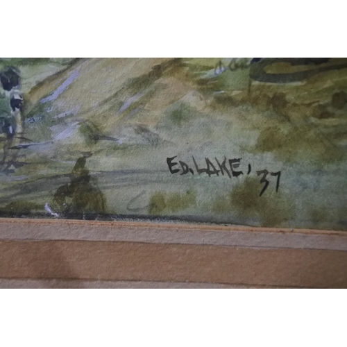 717 - A framed watercolour 'The Bann' signed E D Lake and a vintage floral framed print.