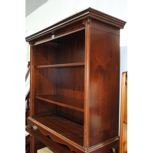 726 - A mahogany bookcase with pillar column detail to the sides, measuring 96cm x 102cm x 38cm approximat... 