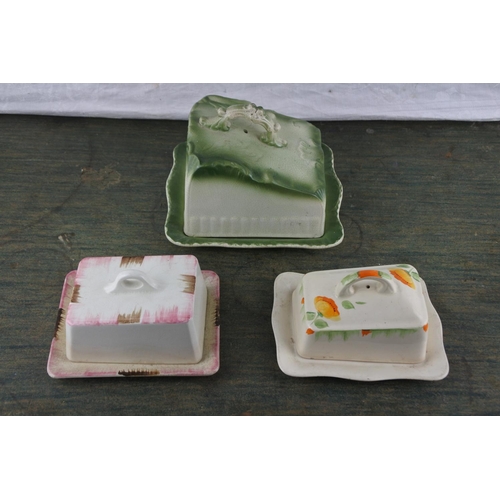 731 - Three antique/vintage butter dishes.