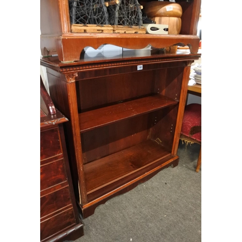 740 - A mahogany bookcase with pillar column detail to the sides, measuring 96cm x 102cm x 38cm approximat... 