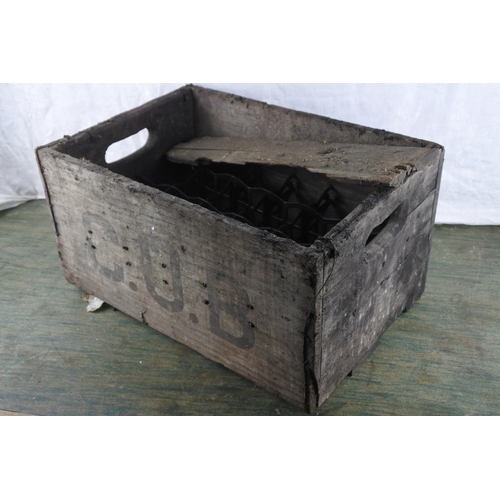 742 - An antique C.U.B. wooden bottle crate.