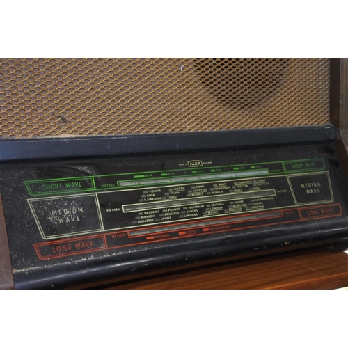 747 - A vintage wooden cased Alba radio, in need of some restoration.