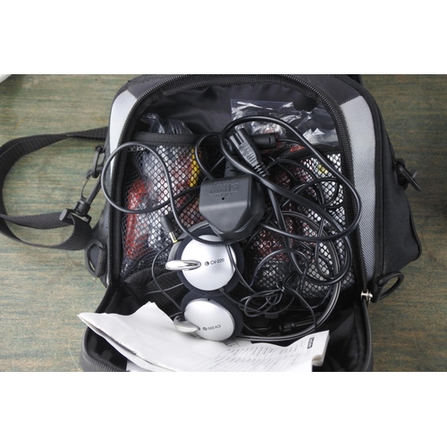 749 - A Corbi DVDMP3/CD/PICTURE CD PLAYER and bag.