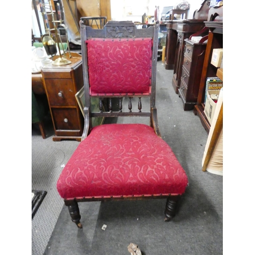 764 - An upholstered ladies armchair.