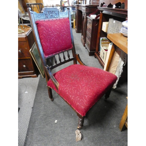 764 - An upholstered ladies armchair.