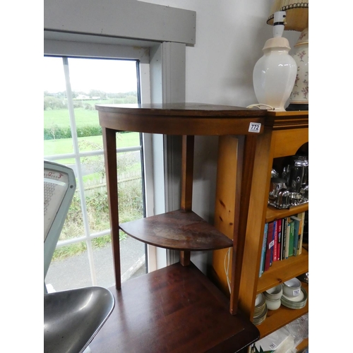 772 - A vintage corner table with undershelf.