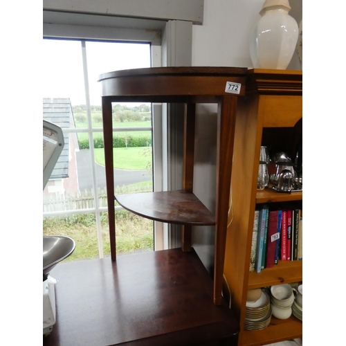 772 - A vintage corner table with undershelf.