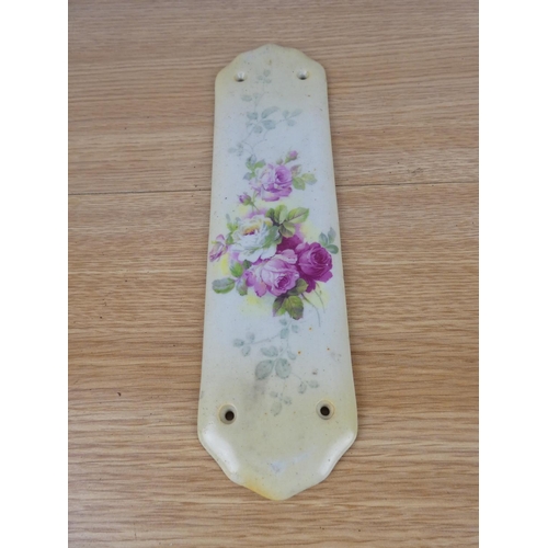 774 - A vintage ceramic floral fingerplate for a door.