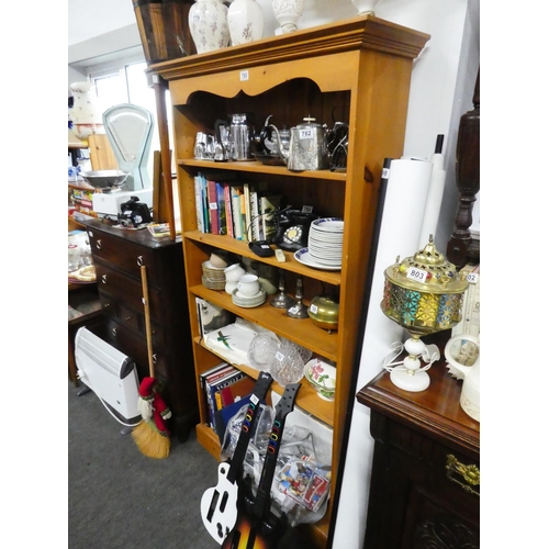 780 - A pine five shelf bookcase, measuring 183cm x 98cm x 26cm in size.