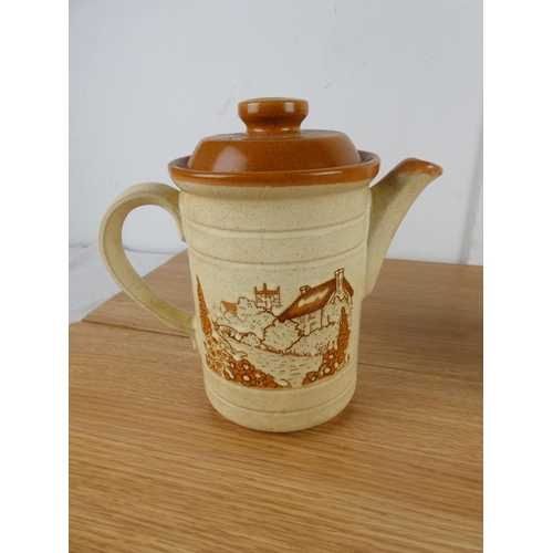 805 - A vintage Ashdale pottery 'Cottage Scene' teapot and another.