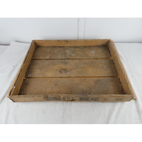 819 - A vintage wooden sunblest bread tray.