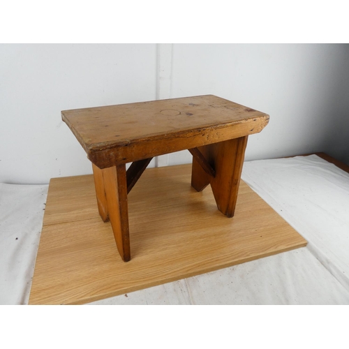 820 - A handmade pine stool.