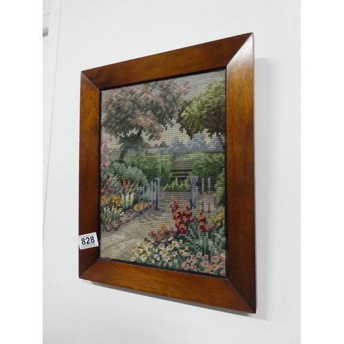 828 - A small oak framed tapestry, measuring 30cm x 23cm.