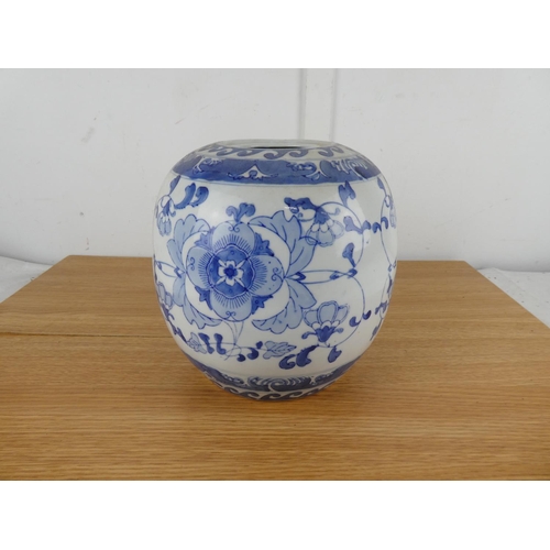 838 - A large blue and white oriental style vase.