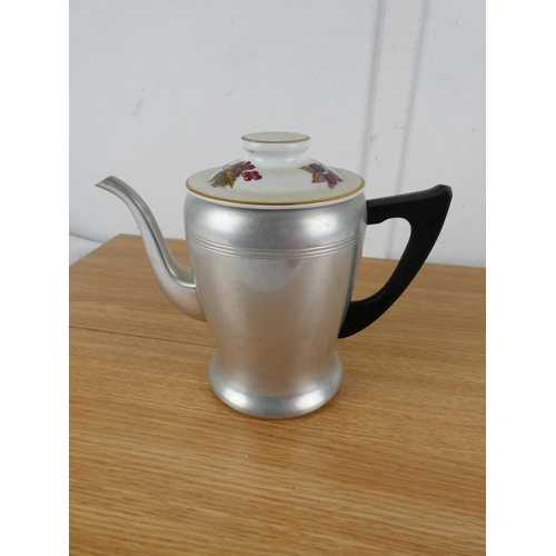 839 - A vintage red enamel coffee pot and two others.