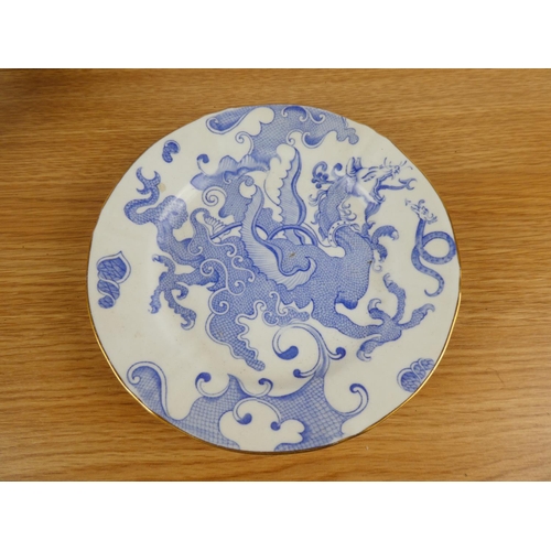 857 - A Royal Worcester 'Chinese Dragon' plate, jug and more.