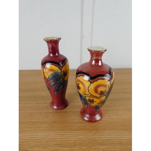 863 - A pair of vintage vases (one a/f).