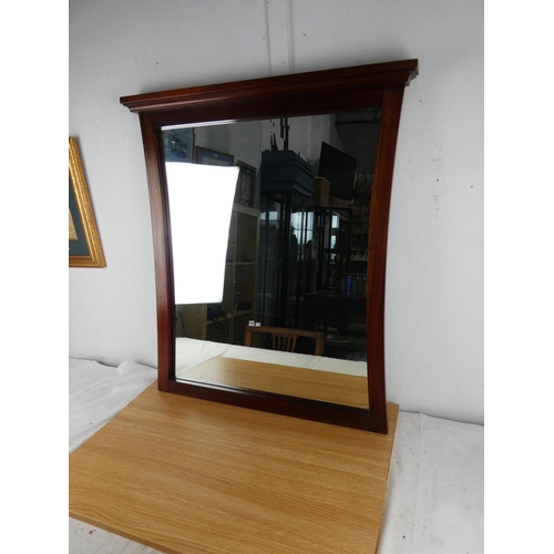 867 - A mahogany framed mirror, measuring 79cm x 70cm in size.