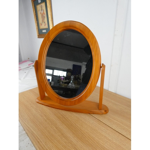 869 - A pine cheval mirror.