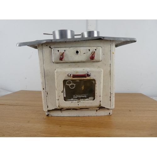 886 - A vintage tin plate toy stove.