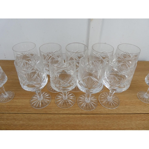 891 - A set of nine and a set of six Tyrone crystal glasses.