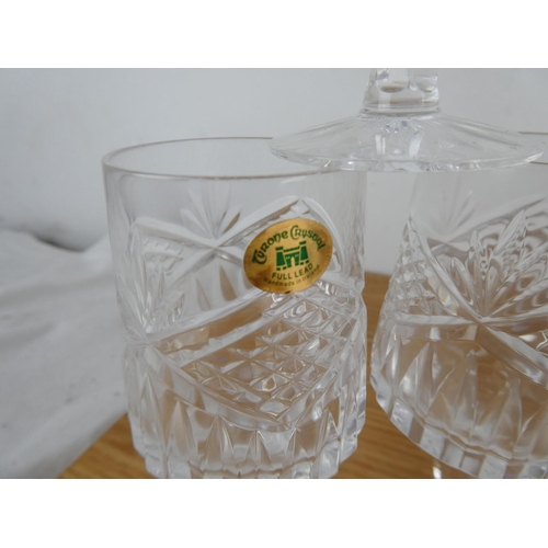 891 - A set of nine and a set of six Tyrone crystal glasses.