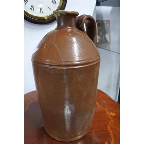 914 - A stoneware flagon 9a/f).