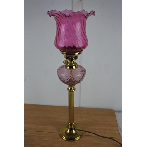 931 - A stunning antique style electric table lamp in the style of an oil lamp.