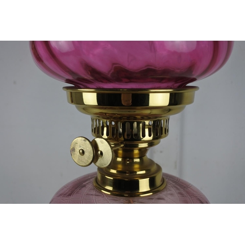 931 - A stunning antique style electric table lamp in the style of an oil lamp.