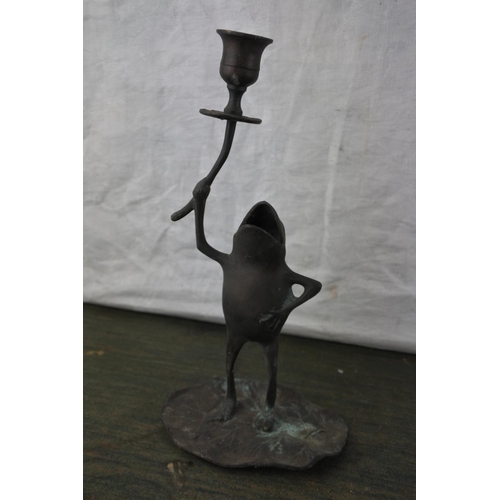 932 - An unusual copper frog candleholder.